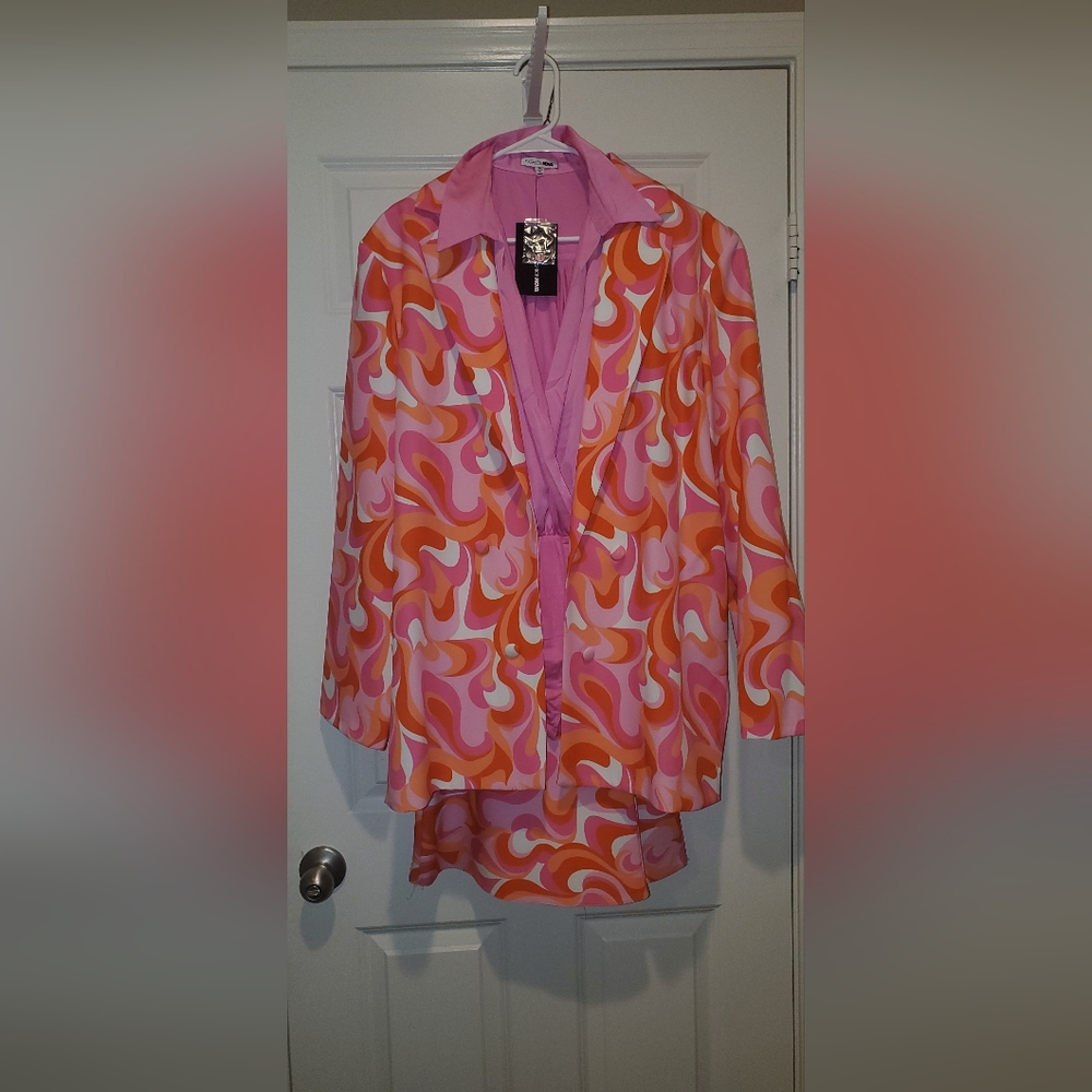 70's inspired pantsuit with pink bodysuit blouse. Only wore once to 70's party